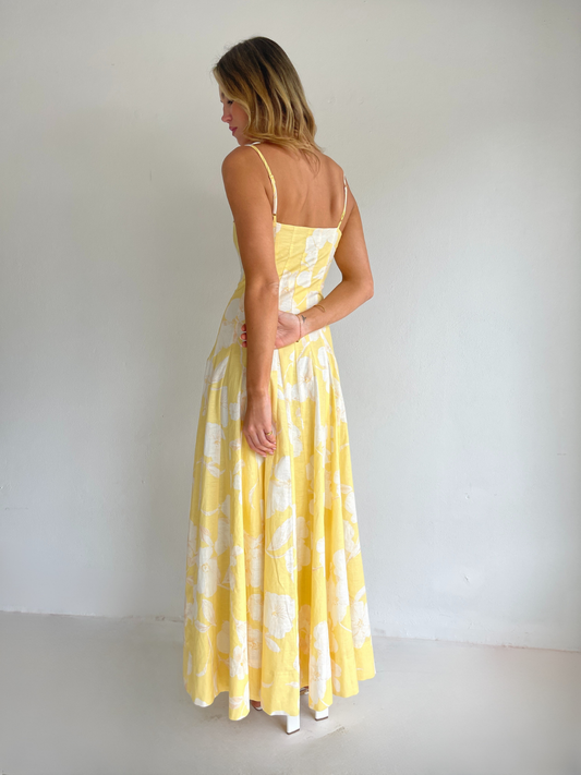 By Nicola Camille maxi dress in amarilla flor floral yellow print with delicate straps, perfect for weddings, summer events and garden parties